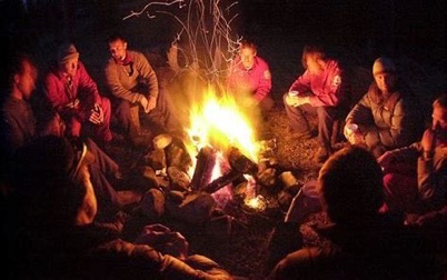 Men Around a Campfire